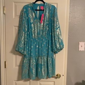 Lilly Pulitzer dress with 3/4 length sleeves.